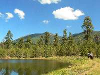 Shultz Tank reflects Mtns
